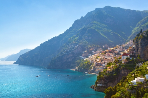 Morning view of Positano cityscape on coast line of mediterranean sea, Italy